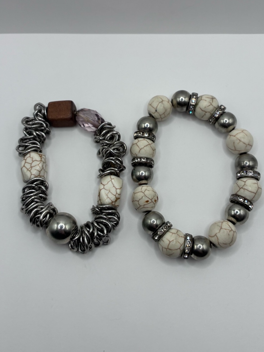 2 Pairs Of Silver Toned White Howlite And Diamond Style Beads Stretch Bracelets.